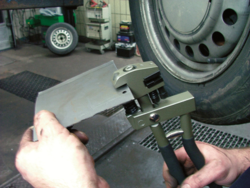 Punch en neerzettang